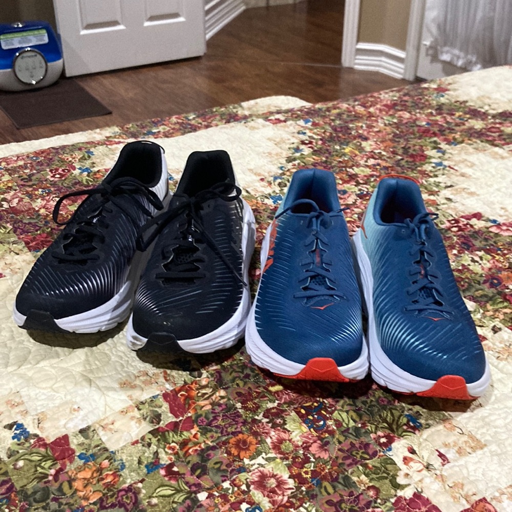 2 pairs of Hoka shoes